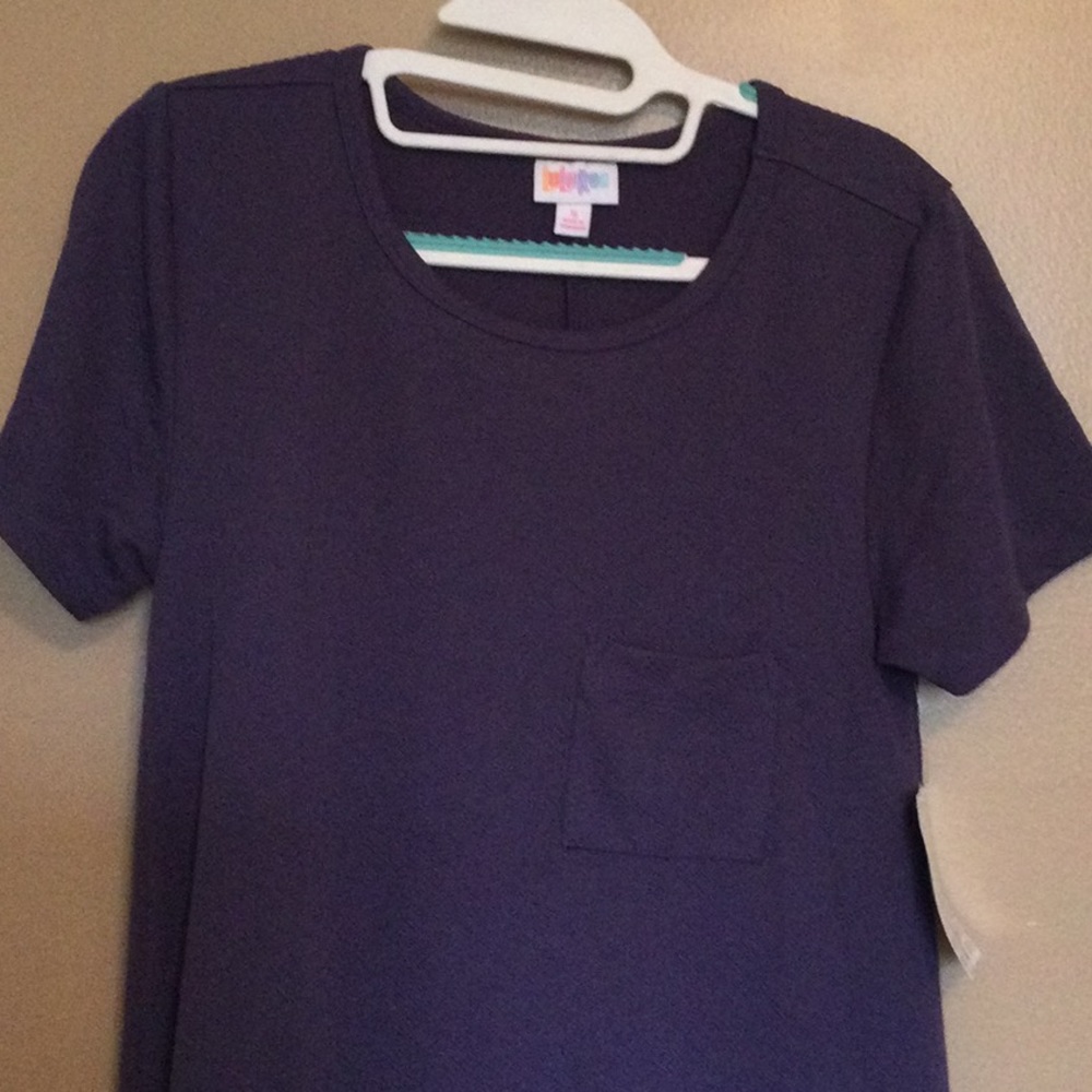 New with tags Lularoe Carly Dress, size Small. Purple color